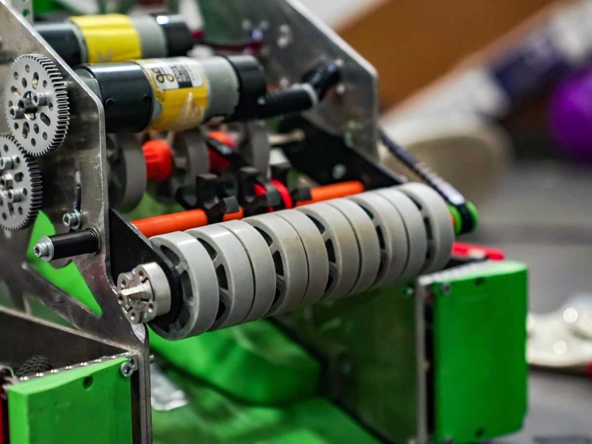 An intake roller on machined side plates on Mech-a-Mind's robot